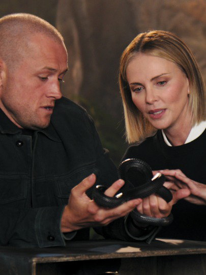 mystery box challenge failed 😂 APEX, starring Charlize Theron and Taron Egerton, is now playing.