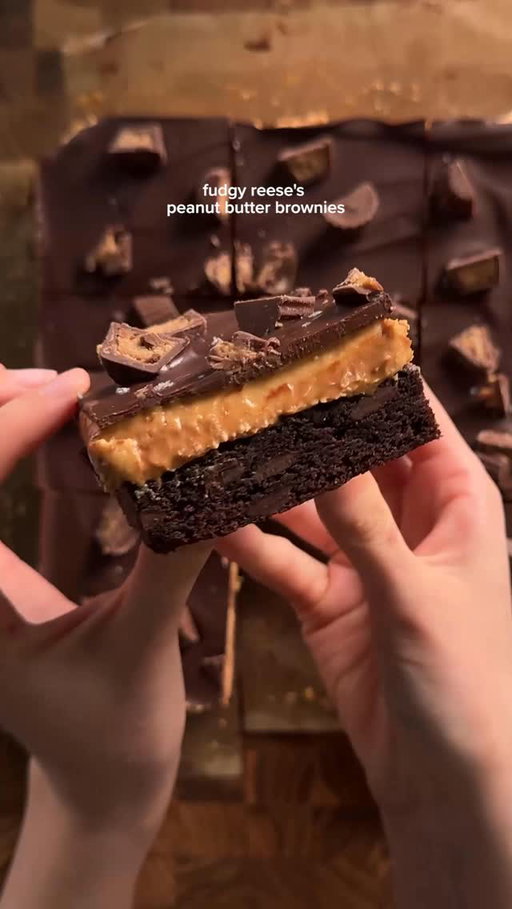 fudgy reeses peanut butter brownies
brownie layer:
2 eggs
1/2 cup (42g) dutch processed cocoa powder
1/2 tsp (3g) each salt, baking powder
1 1/2 tsp (6g) vanilla
1/2 cup (113g) unsalted butter (melted)
1 cup (200g) sugar
3/4 cup (90g) flour
1/4 cup (43g) chocolate chips 
*in a microwave safe bowl, microwave the butter and sugar and its all melted. set aside to cool a bit. in another bowl, mix together the eggs and the cocoa powder, then add in the vanilla, salt, baking powder. fold in the flour and chocolate chips. pour into a 9x9 tray and bake for about 27-30 min. let cool completely. 

peanut butter layer:
1 cup (250g) creamy peanut butter
1 1/2 cups (180g) powdered sugar
4 tbsp (57g) unsalted butter, soft/melted
1/2 tsp (3g) salt
*mix everything together well and then spread evenly on the cooled brownies. set in the fridge a bit to help solidify. then pour on the melted chocolate. sprinkle on peanut butter cups and then let set in the fridge until chocolate has hardened (about 30min-1hr)

chocolate layer:
200g semisweet or bittersweet chocolate
reeses peanut butter cups