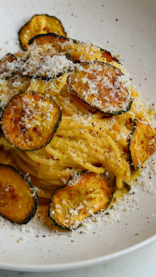 Spaghetti alla Nerano

Spaghetti tossed with fried zucchini and a blend of freshly grated cheeses creates one of those dishes that feels almost too simple for how good it is. It’s rich, glossy, and honestly hard to stop eating once you start. I like to make this for special occasions, like Mother’s Day, but it’s just as good when you want to have a special weeknight dinner.

#pastalover #weeknightdinner #comfortfood #italianfood #mothersday 

Spaghetti alla Nerano, Zucchini Pasta, Easy Italian Dinner, Comfort Food Pasta, Creamy Pasta Without Cream, Weeknight Pasta Recipe, Fried Zucchini Pasta, Simple Italian Recipes, Mother’s Day recipes