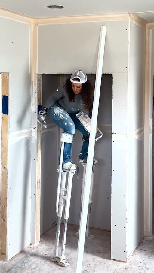 Some days are interesting when your 8ft up in the air 😂 #stilts #drywall #reels
