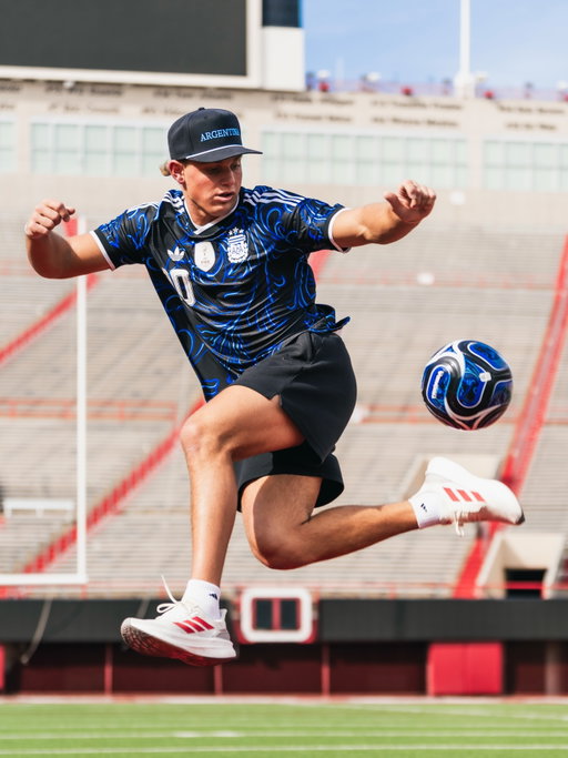 On the field where I play football, showing love for the world’s game too. 🏈⚽️
 Rocking the adidas FIFA World Cup™ Argentina 26 Away Jersey in the stadium today.

Shop link in my bio to get yours.
 @adidas @postgame.official 
 #ad #createdwithadidas #adidasfitcheck