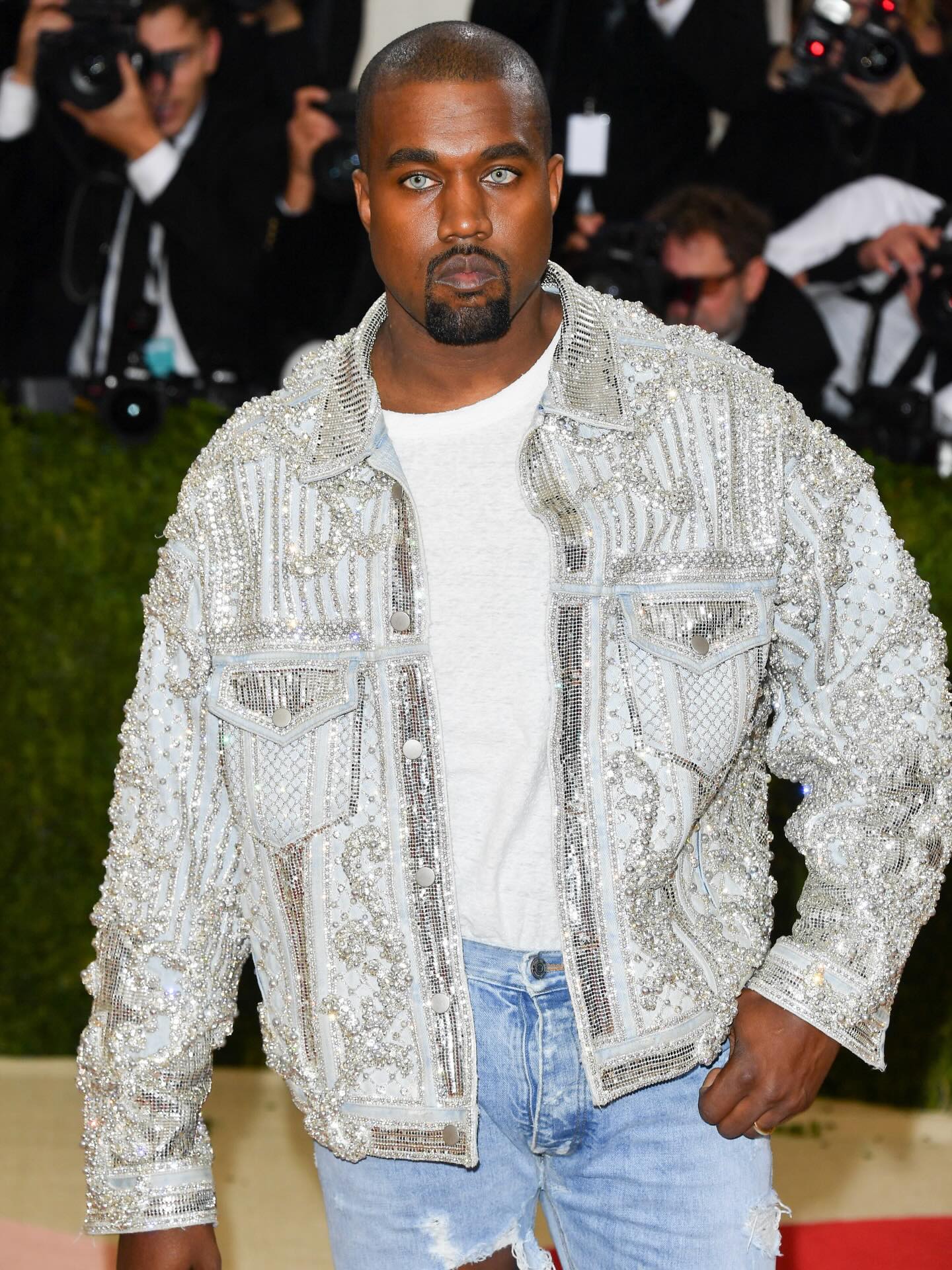 #Ye’s iconic Balmain fit from the 2016 Met Gala‼️🔥

At the 2016 Met Gala, Ye leaned into the “Manus x Machina” theme with a heavily distressed Balmain denim shirt, ripped jeans, and Yeezy boots, paired with colored contact lenses and a raw, unfinished aesthetic that matched the tech-meets-handcraft concept.

Y’all rockin’ with Ye’s 2016 Met fit⁉️