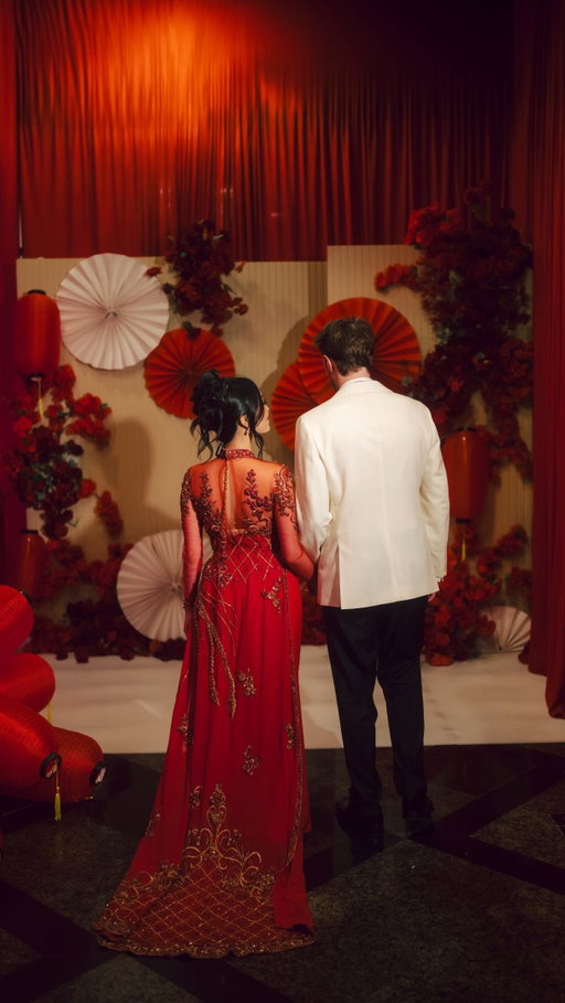 custom áo dài cưới tour ❤️✨

I searched forever for a red bridal áo dài but none ever felt quite right. 
I saw @renee.couture’s beautiful designs online and reached out to see if she had ever made an áo dài before. she hadn’t but was willing to try, and I was willing to risk it despite being nervous about the logistics. probably one of the best decisions I’ve ever made 🥹 

we talked over WhatsApp and she asked me to tell her more about what I was envisioning, Evan and I’s love story, and more about our backgrounds - all while making sure she understood what made an áo dài an áo dài. I sent photos of my family and @kovuthewoof while we chatted over several months, and she sent a few sketches for approval and was so incredibly patient as I changed my mind several times on what colors / designs / cuts I wanted 😅

the first time I saw this áo dài, my jaw just dropped. it was even more beautiful in person than anything I could’ve ever imagined. my mother (a tailor and the world’s harshest critic when it comes to clothing quality 🤣) was SO impressed at the craftsmanship and hand-sewn details. I truly couldn’t believe that she had never made an áo dài before because she absolutely nailed my dream dress!!

she is truly an artist in every sense - designing and creating a perfect and beautifully unique-yet-traditional masterpiece collage of our love story in a way I couldn’t even picture myself. it’s a piece we’ll cherish forever ♥️

#aodai #wedding #2026bride #vietnamese #aodaivietnam