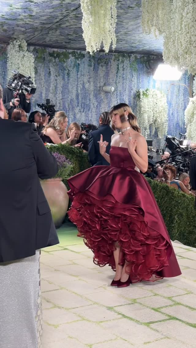 A star on the ice and on the #MetGala red carpet! @alysaxliu stuns in a custom red @louisvuitton gown.