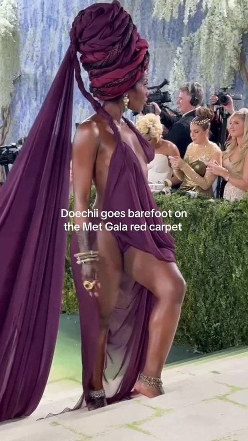 @doechii ditches heels and goes barefoot on the Met Gala red carpet, wearing custom @marcjacobs. 

Video: @leighnordstrom