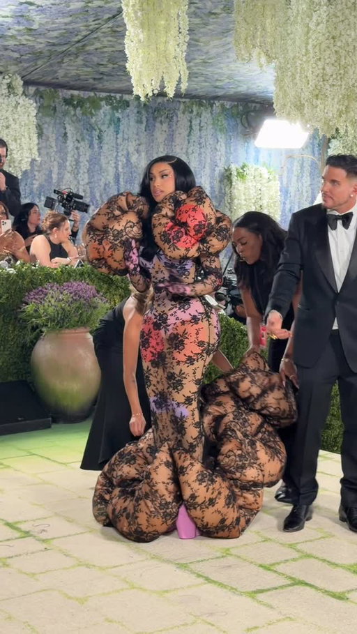 @iamcardib goes for a colorful, sculptural, @marcjacobs moment on the #MetGala red carpet.