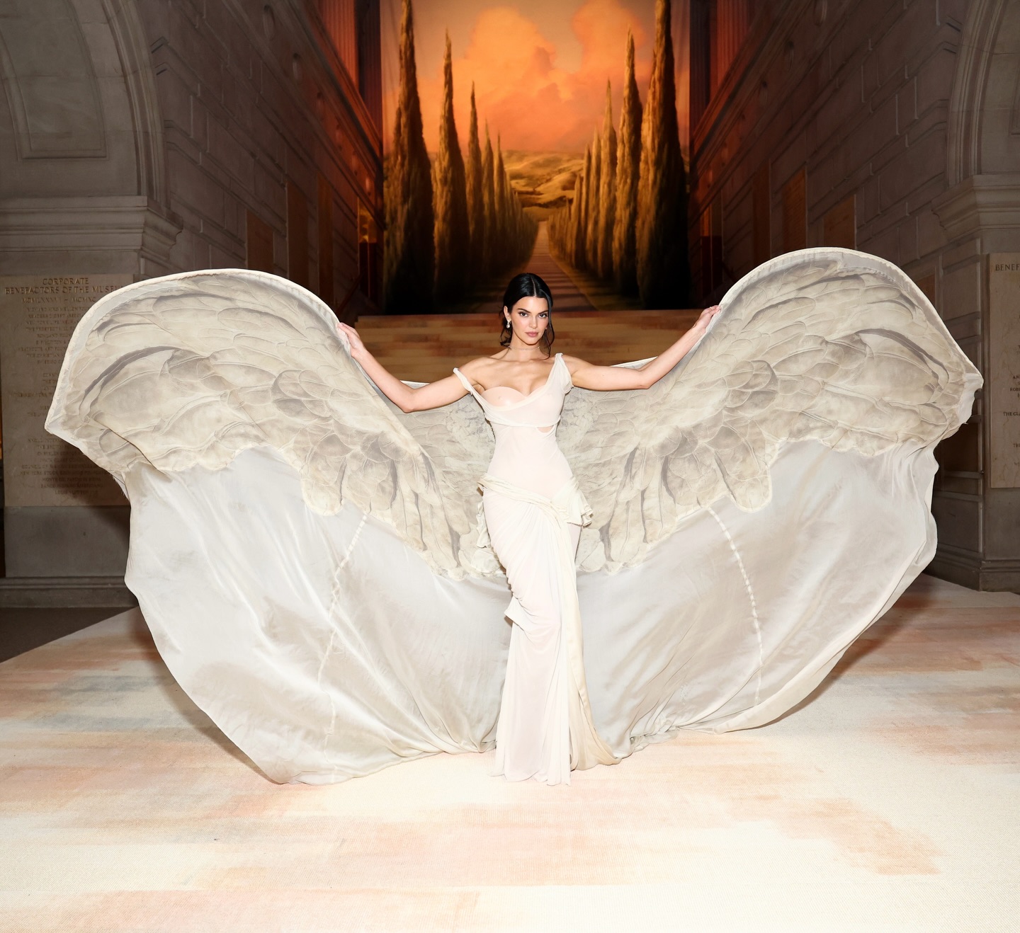 Out of this world.

Our iconic white tee merges with ethereal art, for a one-of-a-kind GapStudio look. By @zacposen for @kendalljenner. For The Met Gala.

“We started with a white Gap t-shirt, manipulating it, pulling and draping to echo the movement you see in carved parian marble,” says Zac. The look draws inspiration from the historic Winged Victory of Samothrace, interpreted through liquid jersey draped over a custom-molded form, hand dyed in tea.

From there, Zac 3D scanned Kendall’s body and built a mannequin to mold the leather corset and bustier to her exactly. And of course, the wing-like extensions feature a digital print of the original sculpture’s wings. The finished look honors the iconic inspiration — transformed into something entirely new.

“Zac is one of those people who make you fall back in love with fashion every time you talk to him,” says Kendall. His passion reflects in his designs and I am so excited we were able to collaborate on this special look.”

#MetGala2026 #GapStudio