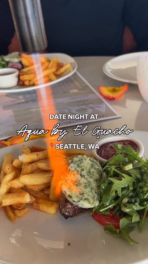 Happy hour with beautiful waterfront views at AQUA by El Guacho @aquabyelgaucho 🥂✨💕

AQUA by El Guacho features Seattle’s finest waterfront dining with views of Elliot Bay, the Olympic Mountains, Mt Rainier and the Space Needle. Their menu is inspired by the Puget Sound, featuring fresh daily selections of fish and 28-day dry-aged angus beef steaks. 🤤

We were invited to enjoy their menu and happy hour (Tues–Fri, 5–6:30pm) and had such a great experience. The views, food, and service were amazing!! 🥳

From the happy hour menu, the steak frites stood out (that parsley butter 😍), plus the $12 specialty cocktails (not featured in the video). From the main menu, the scallops were incredibly fresh, and the Alaskan king crab was sweet and perfectly pre-cracked for easy eating. 🦀 We were recommended the corn & brussels sprouts, which were also super flavorful. 😍

After dinner, we enjoyed views from their deck (which they will be turning into an outdoor dining space 👀) and walked nearby to Olympic Sculpture Park for sunset! 🥰

It was a wonderful date night and we look forward to returning for HH & special events in the future! 💖

Thank you so much to the AQUA by El Guacho team for having us! 💌 #hosted 

#seattlefoodie #seattleeats #seattlerestaurants #datenight