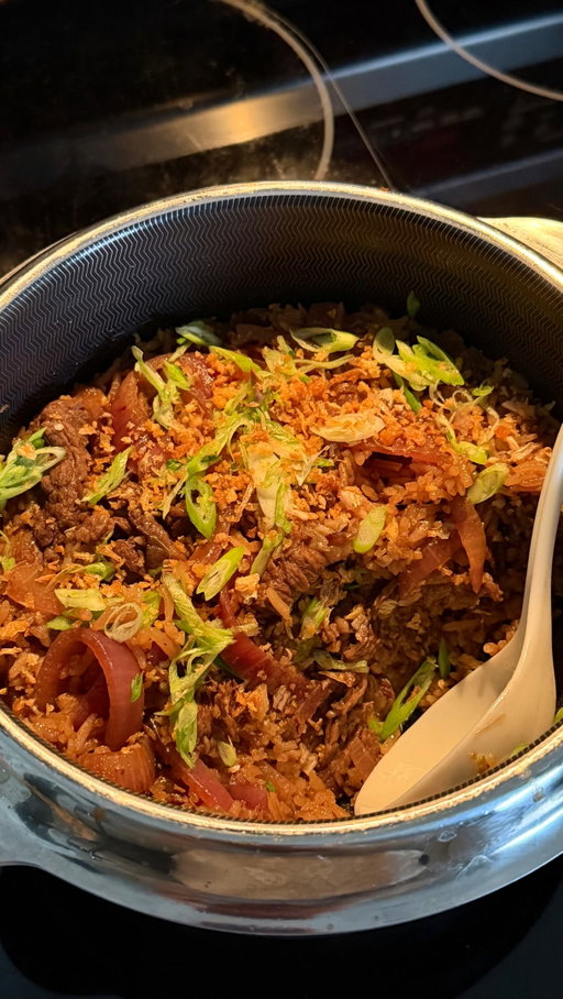 One-Pot Bistek Rice

So I’ve been getting a lot of comments about rice texture and how to avoid the rice becoming mushy. Firstly, these recipes are optimized for white Jasmine rice, which I typically do ~1:1 ratio of rice to water most of the time. While these recipes can technically work for most grains, you would still need to adjust liquid ratios and cooking times accordingly, especially if you’re using rice like Basmati or short-grain. 

And with this particular recipe as well, the onions and beef release tons of moisture while cooking. I trialled this with a whole head of onion, but the rice got a bit too moist so I found half a large head is okay (you can always add more afterwards). It’s also important to not skip the reducing step here (you’ll see it in the recipe card) as it helps concentrate the flavor and corrects the liquid to rice ratio while cooking to prevent it being mushy.

(Pot linked in the recipe —note that as an amazon associate I earn from qualifying purchases)

As always, you can find the full recipe here: https://www.iankewks.com/one-pot-bistek-tagalog-rice/

(Or just comment ”Recipe” and I’ll dm you the full recipe)