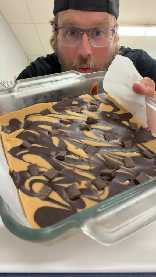 You have to make this chocolate peanut butter fudge!

1 cup peanut butter
1 stick + 2 tablespoons butter
2 cups (ish) powdered sugar 
Chocolate chips (for swirling and for topping)

#groarkboysbbq #themeatteacher #peanutbutter #fudge