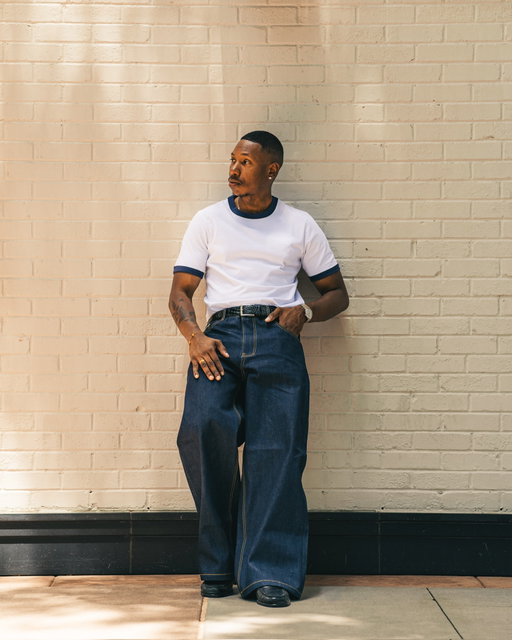 Me for @stellarstudios.dk 👕👖. Here I present the white & blue ringer tee paired with selvedge denim and a black croc leather belt. Designed with a clean, refined approach to everyday menswear, each piece brings together classic inspiration and modern structure. The contrast detailing on the tee gives a subtle nod to vintage athleticwear, while the raw selvedge denim and textured leather belt elevate the look with depth and character.
What I appreciate most is the balance — effortless yet intentional, minimal yet still commanding attention. Timeless staples, done the right way.
Photo Creds 📷: @doppelmayrphoto