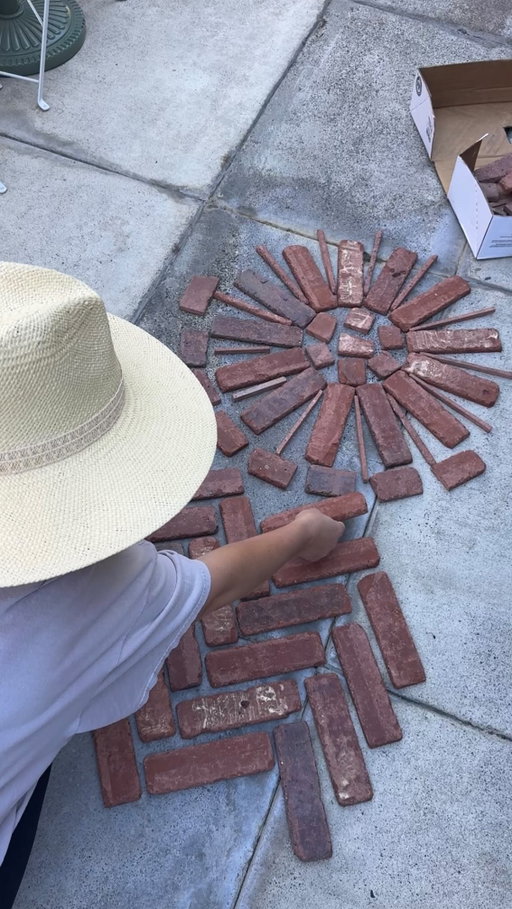 Manifesting a beautiful brick pathway over here. 🤭 I had a couple boxes of thin brick leftover from my last project - So you know I had to lay a few down to get an idea. It would be on a much bigger scale but I’m in loooove.