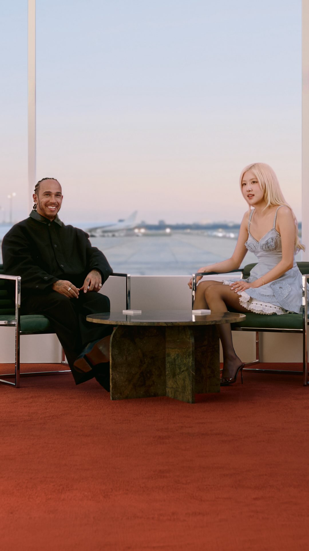Gate side chat.

Enter The Lounge, where ROSÉ (@roses_are_rosie) and @LewisHamilton, RIMOWA’s Global Brand Ambassadors, unpack travel rituals and anecdotes between flights.

Watch the full video to hear their stories.

#RIMOWA