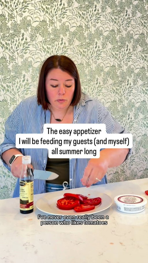 Recipe⬇️
-ripe beef steak tomato sliced 1 inch 
- Salt the tomatoes on both sides and then let it sit for 10 minutes. 
-Top the tomato slices with a tablespoon of stracciatella, also known as the soft cheese inside of a burrata ball. You can find a burrata or the stracciatella at some grocery stores and also at Aldi and Trader Joe's.

-Top that with balsamic reduction (they use balsamic pearls at the restaurant, but they are expensive, so I just do balsamic reduction). 
-Top that with a little more flaky salt and some fresh basil if you have it and enjoy. 

My guests will be enjoying this appetizer all summer long because I will be enjoying it all summer long! 

#kelsewhatelse  #summerappetizer #midwesternmom