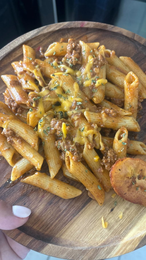 Puerto Rican Inspired Pasta Recipe 

* 1lb pasta 
* Fresh Sofrito 2 culantro, 6 garlic cloves, 3 Aji dulce, half green bell pepper, and half small onion
* 2tbsp Achiote oil (recipe pinned) or 2 tbsp oil for Sofrito
* 1lbs 93% ground beef (less greasy) 
* 1tsp adobo for ground beef
* 1 can tomato sauce
* 2tbsp tomato paste 
* 2tbsp ketchup
* 2c water
* Homemade sazon or regular packet sazon (1tsp annato powder, 1/2tsp paprika, & 1/4 turmeric) 
* 1tsp oregano powder 
* 1/2tsp black pepper
* 2tsp garlic powder
* 1/2tsp adobo for sauce
* Salt to taste towards the end
* Queso de papa or mild cheddar cheese (optional) to your liking 

1. Follow the recipe as you see in the video. 
2. Once you create your sauce, bring to boil, then bring to low/simmer for 10 minutes or until the sauce thickens up. 
3. Add your cooked pasta, mix well, leave stove on low. Cover let the pasta cook in the sauce for additional 5-10 minutes on low/simmer heat
4. Add cheese to your preference, totally optional
