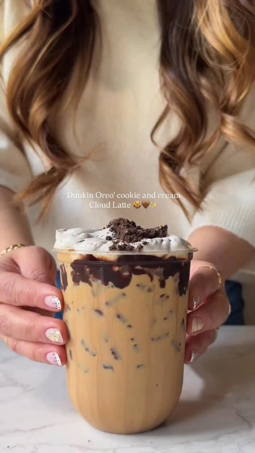 My version of Dunkin ‘Oreo cloud latte 🤎✨

Recipe :
1/2 tbsp of white chocolate sauce 
1 tbsp of marshmallow syrup 
2 shots of espresso + 4 oz of milk 

Oreo cold foam
1 tbsp of Oreo Pudding powder 
3 tbsp of heavy cream + 2 tbsp of milk 
Froth it, add some Oreo and enjoy it 😋 

#coffee #icedcoffee #homecafe #dunkin #oreocloud