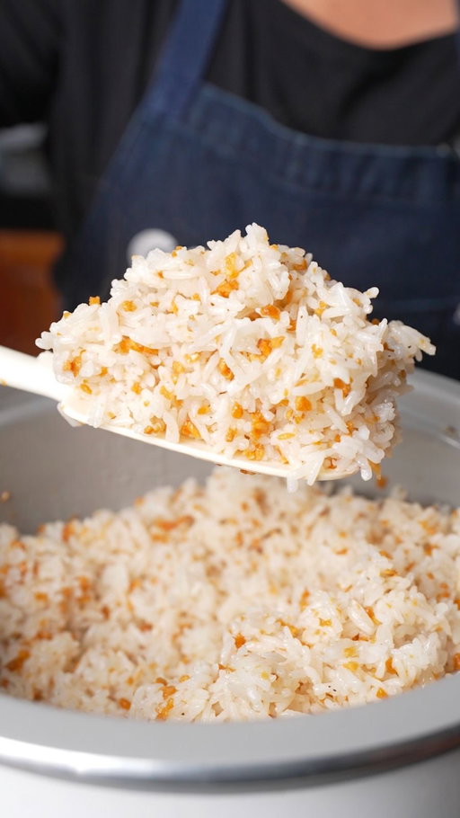 The SECRET to great GARLIC RICE 🧄🍚

Ingredients

1 cup garlic, finely minced 
1 cup oil
Salt to taste
Pepper to taste
5 cups of warm cooked rice 

Procedure
1. In a cold pan, add 1 cup of finely minced garlic and 1 cup of oil before turning on the heat. Turn the burner to medium-low and stir occasionally. 
2. Pull the garlic off the heat the moment they turn a light golden brown. Strain immediately into a heat-proof bowl, keeping the crispy bits and the flavored oil separate.
3. Take your cooked rice and break up any clumps. Add the crispy garlic bits and mix them evenly into the rice. Drizzle with garlic oil, then season with salt and pepper. Stir to fully incorporate, and serve with your favorite silog or my recipe for making Rodic’s tapsilog at home 🙂

#instafood #foodlover #lumpiaqueen #foodie #food