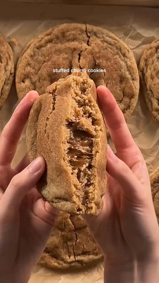 stuffed churro cookies
cookie dough:
1 cup (226g) unsalted butter, soft
1/2 cup (100g) light brown sugar
1/3 cup (75g) white sugar
1 whole egg + 1 yolk
2 tsp (8g) vanilla extract
1 tsp (4g) vanilla bean paste
3 cups (350g) ap flour
1/2 tsp (3g) salt
1 tsp (6g) baking soda
1/4 tsp (1g) baking powder
1 tsp (3–4g) ground cinnamon
*cream together the butter and sugars and then mix in the eggs and vanilla. if you dont have vanilla bean paste you can also add a tad more vanilla extract. in another bowl, whisk the dry ingredients together and then add the dry mix into the wet. set in the fridge for at least an hour. once ready, flatten each dough ball into a disk and stuff with the frozen dollop. roll into ball and then roll the dough into cinnamon sugar. bake at 350 for 11-12 min (time will vary). let cool on the pan completely to prevent the filling from leaking out!

dulce de leche filling:
1/3 cup (100g) dulce de leche
1 tsp cornstarch
*mix the cornstarch into the dulce de leche to thicken it a bit then dollop into 1-2 tsp sized. freeze until frozen (2hrs). 

cinnamon sugar coating:
1/2 cup (100g) white sugar
1 tsp (5–6g) ground cinnamon