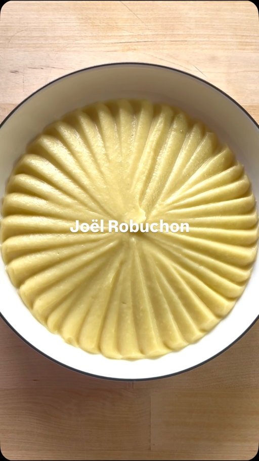 How to Make Joël Robuchon’s Famous Mashed Potatoes 🥔🇫🇷 -@thestrongcook CLASSICS 

FULL RECIPE BELOW ⬇️

INGREDIENTS: 
1.25kg la Ratte potato (or Yukon Gold) (your yield should be ~1kg after peeling)
250mL whole milk **
250g unsalted butter, diced 
4-5 sprigs thyme
1 tsp black peppercorns
2 cloves garlic, gently smashed
Fine sea salt, to taste

** All of this milk likely won’t be needed. Some can be kept aside to re-heat the potatoes later.

INSTRUCTIONS:
1. In a large, heavy bottom pot, ideally large enough to fit all your potatoes in a single layer, cover your potatoes with cold water. Bring to a boil over high heat, then lower your heat to medium. Allow your potatoes to cook for 20-30 minutes, or until you can pierce your potatoes with a pairing knife with zero resistance. 
2. While your potatoes are cooking, bring your milk to a boil with your thyme, garlic and black peppercorns. As soon as it comes to a boil, turn off the heat and allow the aromatics to steep while the milk stays hot.
3. When your potatoes are done cooking, strain them, and let them sit in the strainer for 5-10 minutes to allow steam to be released. Once they are cool enough to touch, but still hot, peel the potatoes & discard the skins.
4. Press your potatoes through a potato ricer into a large bowl. Strain the aromatics out of your milk, and pour half of the milk into the riced potatoes. Fold the milk gently into the potatoes until incorporated. Then, pass your potatoes once more through a fine mesh strainer into a large pot (this step is optional, but does result in THE smoothest potatoes).

RECIPE CONTINUES IN THE COMMENTS ⬇️

#mashed #potatoes #michelin #homecooking recipe