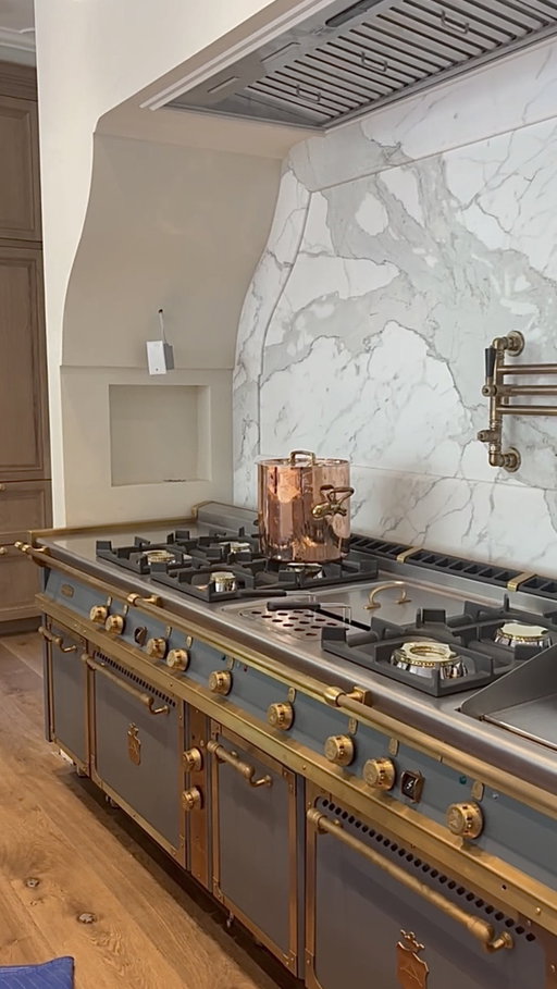 Designed for a family of 7 who loves to gather, this custom Officine Gullo range in a smoky blue-gray with brass accents brings both beauty and function to the heart of the home. Complete with a built-in pasta maker, griddle, warming cabinet, and dual cooktops, it’s European romance meets everyday living.

Builder: @mcewancustomhomes 
Architect: @broadbent_as 
Coming soon to: @uvparade