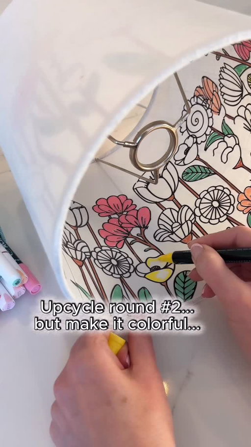 Colored lampshade upcycle - My first upcycled lampshade using decals on the inside completely went viral and so many of you kept saying… “Okay but what if you tried one with color?” So challenge accepted… 🤗
This time I went full floral with it and thought these whimsical flowers were just asking for a little color. Instead of pulling out messy paint and it dripping everywhere I grabbed my acrylic paint markers and they ended up being absolutely perfect for filling in between all of the black decal outlines.

It was simple, relaxing, and so fun watching it all come to life. And I have to admit… adding color gave this lampshade such a different look and feel from my first black-and-white version. Same idea, completely different vibe, and I’m kind of loving both for totally different reasons👍🏻 #diy #lamp #decor #lights #art