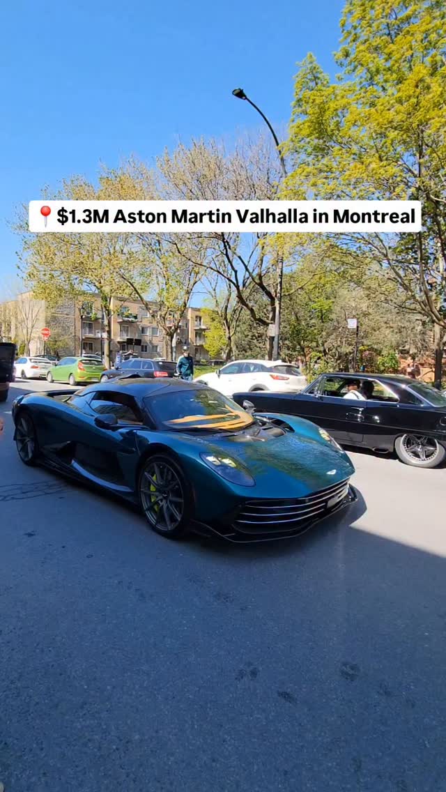 $1.3M Aston Martin Valhalla in Montreal at @cafegotsoul for the @cafegotsoul.cc first Cars & Coffee of 2026.

The Aston Martin Valhalla is a limited-edition (999 units) mid-engine plug-in hybrid hypercar/supercar from Aston Martin, developed with input from Red Bull Racing/F1 tech. It's positioned as a more usable "Son of Valkyrie" for road and track.

Key specs:
Power: ~1,064 hp (817 hp from a 4.0L twin-turbo flat-plane V8 + ~247 hp from three electric motors; AWD with torque vectoring).

Performance: 0-62 mph (~100 km/h) in ~2.5 seconds, top speed ~217 mph (350 km/h), massive downforce (600+ kg at speed) via active aero.

Weight/Construction: Carbon fiber chassis/tub, roughly 1,650–1,800 kg curb weight.

Other: 8-speed DCT, short EV-only range (~10 km), F1-inspired suspension/aero, dihedral doors.73c11a

Price (CAD): Canadian dealers list it starting from around $1.26–$1.27 million CAD (cash purchase price including freight, PDI, and applicable luxury tax). This aligns with the ~US$1.05 million base MSRP plus Canadian market adjustments.

Production started ~2025, with deliveries ongoing. Reviews praise it as an engaging, surprisingly drivable rocket ship with hypercar tech but better everyday manners than the extreme Valkyrie. It's Aston's first series-production mid-engine car.