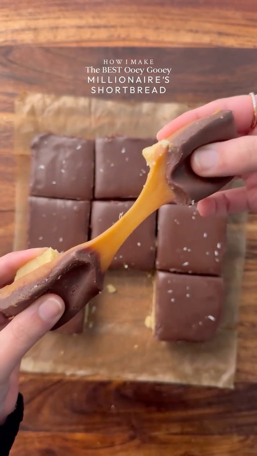 The BEST ooey gooey millionaire’s shortbread 🤤

INGREDIENTS: 
For crust: 
•225g butter 
•100g caster sugar 
•1 egg yolk
•1/4 tsp salt 
•240g flour 
For caramel layer 
•115g butter 
•200g light brown sugar 
•1/2 tsp salt 
•397g condensed milk 
•60ml golden syrup 
For chocolate layer
•250g chocolate 
•80ml cream (if you want hard chocolate layer you can skip milk and just melt chocolate alone)

INSTRUCTIONS:
•Make the shortbread crust: Preheat oven to 170°C (340°F) and line an 8x8-inch baking tin with parchment paper.
•In a bowl, cream together the butter and caster sugar until smooth.
•Mix in the egg yolk and salt.
•Add the flour and mix until a soft dough forms.
•Press the dough evenly into the lined tin.
•Bake for 20–25 minutes, or until lightly golden and Let it cool completely.
•Make the caramel layer: In a saucepan over medium-low heat, add butter, light brown sugar, salt, condensed milk, and golden syrup.
•Stir continuously until the butter melts and sugar dissolves. (STIRRING IS IMPORTANT)
•Increase to medium heat and cook, stirring constantly, for 8–12 minutes until thickened and deep golden.
•Pour over the cooled crust and spread evenly.Chill for 1–2 hours, until set.
•Make the chocolate ganache topping: Heat the cream and chocolate together using double broiler method and Stir until smooth and glossy.
•Pour over the chilled caramel and spread evenly.
•Chill & slice: Chill for at least 2 hours (or overnight for clean slices).
•Let sit at room temperature for 10–15 minutes before slicing for that perfect ooey gooey texture.

Pro tip for clean cuts: Warm your knife in hot water and wipe between slices.🤤

#millionaireshortbread #caramel #fyp #explorepage #foodstagram