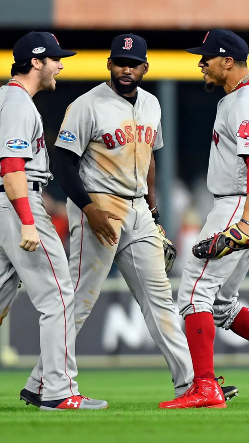 The Boston Red Sox’s legendary “Killer B’s” outfield — Mookie Betts, Andrew Benintendi, and Jackie Bradley Jr. — became one of the most iconic trios in franchise history during the 2018 season. Known for their elite defense, clutch hitting, and infectious chemistry, they helped lead Boston to a franchise-record 108 wins and a World Series championship. 

Each player perfectly fit the dimensions of Fenway Park: Benintendi mastered the difficult Green Monster in left field, Bradley Jr. patrolled center with spectacular highlight-reel catches while earning ALCS MVP honors and a Gold Glove, and Betts dominated right field on his way to a Gold Glove, the American League MVP award, and one of the greatest individual seasons in Red Sox history. 

Beyond their production on the field, the trio became fan favorites for their energy and personality, especially their choreographed postgame celebrations in the outfield that became known as “Win, Dance, Repeat,” symbolizing the joy and swagger of one of the greatest teams Boston has ever seen.

(via bkprod/TT)

#mookiebetts #andrewbenintendi #redsox #baseball #mlb