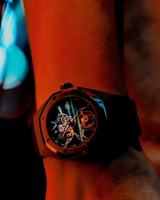 The new Royal Oak Concept Flying Tourbillon stands as a continuation of our unwavering commitment to connecting creativity and culture. Designed with @yoon_ambush and @verbal_ambush, the 38.5 mm limited-edition timepiece offers a closer look at the mechanics of time, for a deliberate return to what is essential.

At its core, Calibre 2982 debuts with an anodised red aluminum tourbillon cage against a shimmering black aventurine dial. The openworked design highlights a bold, sculptural geometry, while the case is executed in sand-blasted titanium for a refined, resilient texture.

Ref. 26643TI.OO.D002CA.01

#AudemarsPiguet #RoyalOakConcept