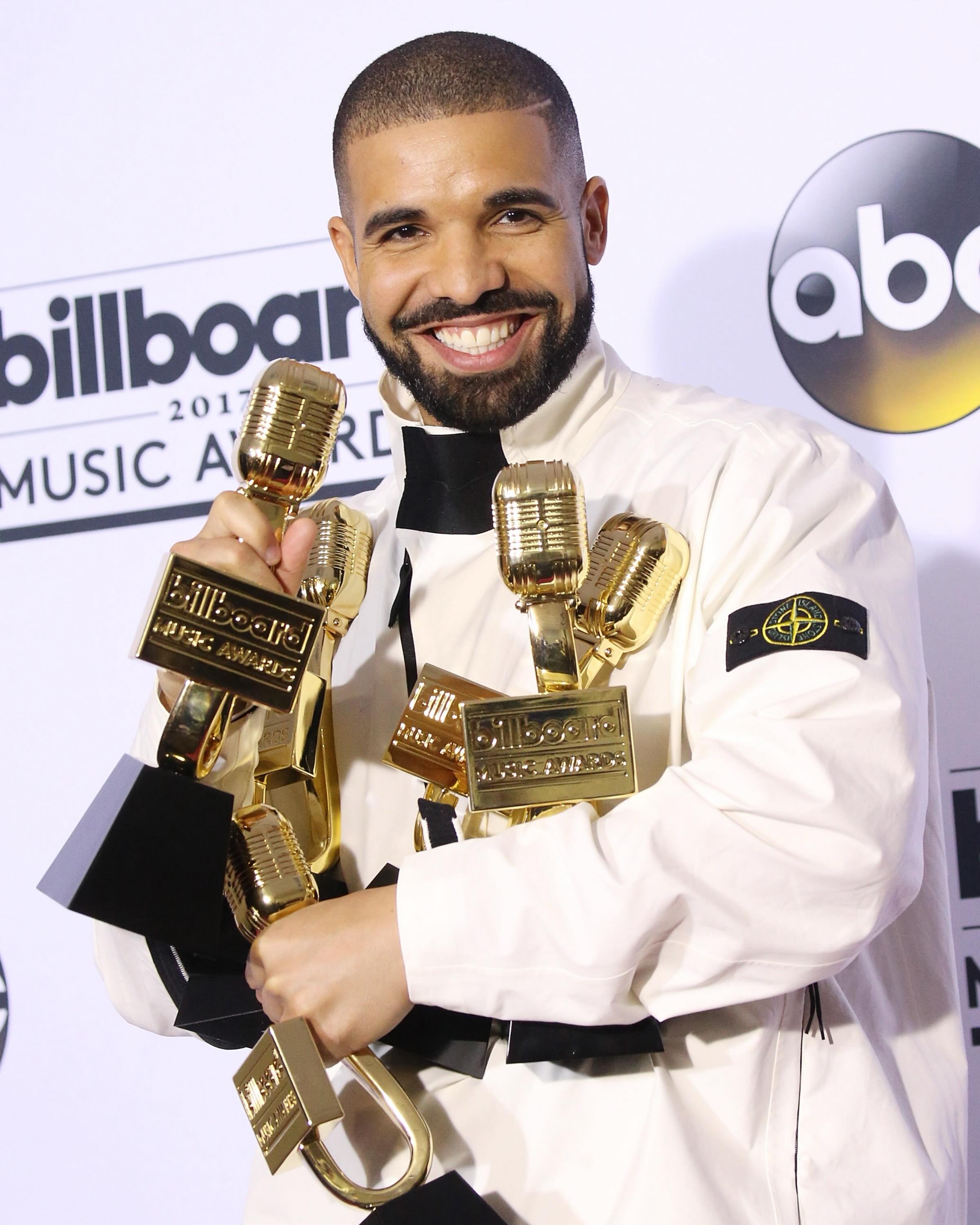 9 years ago today, Drake pulled up to the 2017 Billboard Music Awards in Las Vegas dressed head to toe in all white Stone Island and Air Force Ones, ready for one of the biggest nights of his career👇

He entered the T-Mobile Arena with 22 nominations across 19 categories and by the time the night was over he had walked away with 13 wins, breaking Adele’s record of 12 wins in a single night which she had set in 2012. The sweep covered every major category the show had to offer including Top Artist, Top Male Artist, Top Billboard 200 Artist, Top Hot 100 Artist, Top Streaming Songs Artist and Top Rap Artist, all fueled by the dominance of ‘Views’ and “One Dance.”

When Prince Michael Jackson walked out to present the Top Artist award, the room already knew what was coming. Drake accepted the trophy and immediately turned the moment into something personal, waving his entire crew up to the stage with him. He spotted his father Dennis Graham in the crowd, who had shown up in a full purple suit and purple shoes, and told the crowd “Look at my dad looking all sharp.” He then turned to Lil Wayne and told the room he was the man responsible for his entire career. Finally he looked at Nicki Minaj standing beside him and called her the love of his life. In one acceptance speech Drake honored three of the most important people to his career 

Thirteen awards later, it was the perfect ending to a perfect night