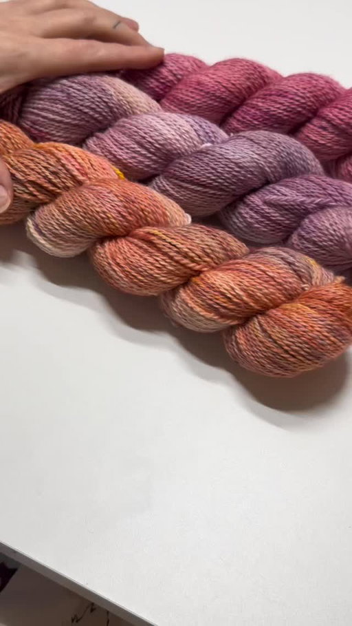 Álfahús Sumar | Summer Elf House

Each skein dip dyed with the same undertone and then dyed again with pour overs of multiple colors to create 3 distinct color directions. Pinks, peaches and purples- each skein is unique but created to work together

Hand dyed by me. 40% Icelandic 60% merino blend.

Launching May 25th. Head to the link in my bio to subscribe to be the first to know when the new Icelandic Collection drops.