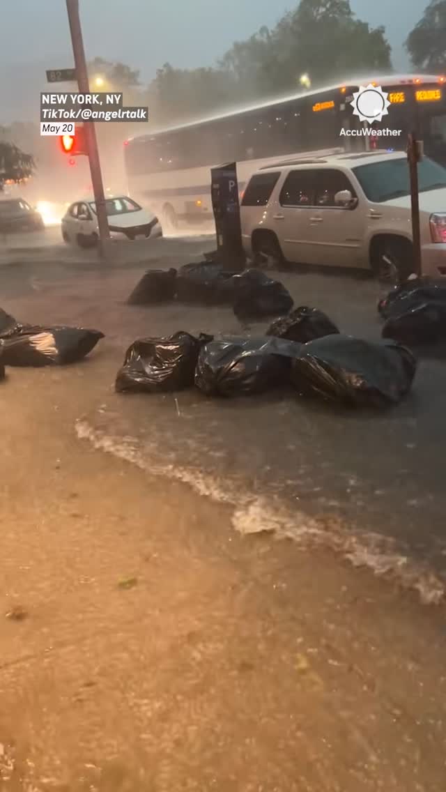 "This is crazy!" Trash bags floated down flooded sidewalks in New York City after intense rainfall this week.