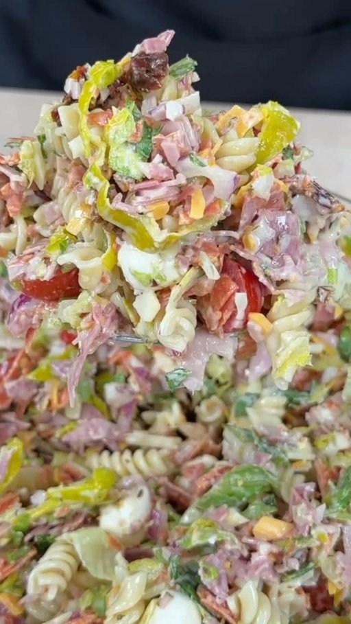 Chopped Italian Pasta Salad 🔥🔥

Aside from maybe my seafood salad recipe.. this has to be the best Pasta Salad ever…. If you’re planning to host or attend a cookout this holiday weekend… make sure you add this to the menu 

Shopping List:
INGREDIENTS
* 	1 pounds short pasta (rotini, fusilli, or cavatappi)
* 	2 tablespoons kosher salt (for pasta water)
* 	3 cups romaine lettuce, chopped
* 	4 ounces pepperoni, chopped
* 	4 ounces salami, chopped
* 	3 ounces deli ham, chopped
* 	4 ounces sharp cheddar cheese, diced
* 	6 ounces mozzarella, slices (plus mini fresh mozzarella balls)
* 	0.5 cups red onion, finely chopped
* 	1/4 cupssun-dried tomatoes, chopped
* 	1/2 cup pepperoncini, chopped
* 	1 cups cherry tomatoes, halved
* 	1/2 cup mayo
* 	1 tablespoonsDijon mustard
* 	3 tablespoons red wine vinegar
* 	3 tablespoons olive oil
* 	1 tablespoon balsamic glaze
* 	1 tablespoon Italian seasoning
* 	1/2 teaspoon red pepper flakes
* 	1/2 teaspoon kosher salt (for dressing)
* 	1 garlic clove, grated into dressing

#mrmakeithappen #foodies #recipes #pastasalad