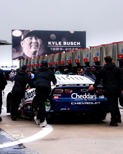 A silent garage pays its respects as the No. 33 @rcrracing Chevrolet unloads at @charlottemotorspeedway.