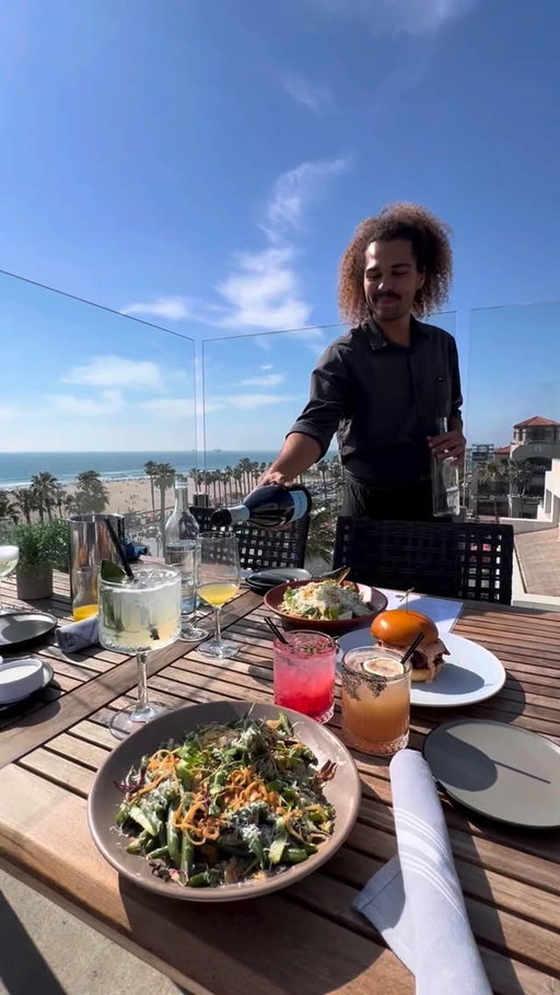 💎@joliehuntingtonbeach 🌊 THIS IS WHY PEOPLE FALL IN LOVE WITH #HUNTINGTONBEACH ✨
🍸 OCEAN VIEW ROOFTOP • WEEKEND SUNSET VIBES • BRUNCH • COASTAL CALIFORNIA LUXURY 🤍

🌅 Rooftop lounge is especially popular on weekends during sunset hours & evening cocktail time

📍 300 Pacific Coast Hwy Suite 220, Huntington Beach, CA 92648

🌐 www.joliehb.com
📞 (714) 740-2524

🎥👉 Follow: @nika_usai (1.3M) • @nikafinds.food • @joliehuntingtonbeach

👉 Also follow: @visitahuntingtonbeach • @surfcityusa • @orangecounty • @bestofdtla • @losangelesgrammers • @santaanaupdates 

Some restaurants serve food.
Others create a feeling you remember long after you leave. ✨

Jolie is one of those places.

Located directly on Pacific Coast Highway across from the ocean, Jolie has quickly become one of Huntington Beach’s most talked-about upscale coastal restaurants — combining elevated California cuisine, rooftop cocktails, ocean views, brunch culture, and that relaxed Orange County luxury atmosphere people travel to California for. ✨

The entire space feels cinematic.
Golden sunsets over the Pacific.
Open-air patios.
Palm trees moving in the ocean breeze.
Beautiful design.
A rooftop vibe that instantly makes you want to stay for hours. 🤍

✨ WHAT MAKES JOLIE SPECIAL

🥂 Beautiful rooftop & ocean-view dining
🌊 Located in the heart of Surf City USA
🍸 Craft cocktails & elevated bar program
🥩 Premium steaks, seafood & modern American cuisine
🍳 One of the most popular brunch spots in Huntington Beach
🌅 Incredible sunset atmosphere right on PCH
📸 One of the most aesthetic restaurant locations in Orange County

The restaurant was created by the hospitality group behind well-known Southern California concepts including Goldfinch in Irvine and The 908 in Long Beach.

✨ WEEKEND BRUNCH & ROOFTOP

☀️ Weekend brunch starts Saturdays & Sundays around 10AM
🌅 Rooftop atmosphere becomes especially popular during sunset hours
🍸 Perfect for girls brunches, birthdays, date nights & Orange County weekends

📍 Restaurant: @joliehuntingtonbeach
🌴 Travel & Lifestyle: @nika_usai
🍽 Food Discoveries: @nikafinds.food