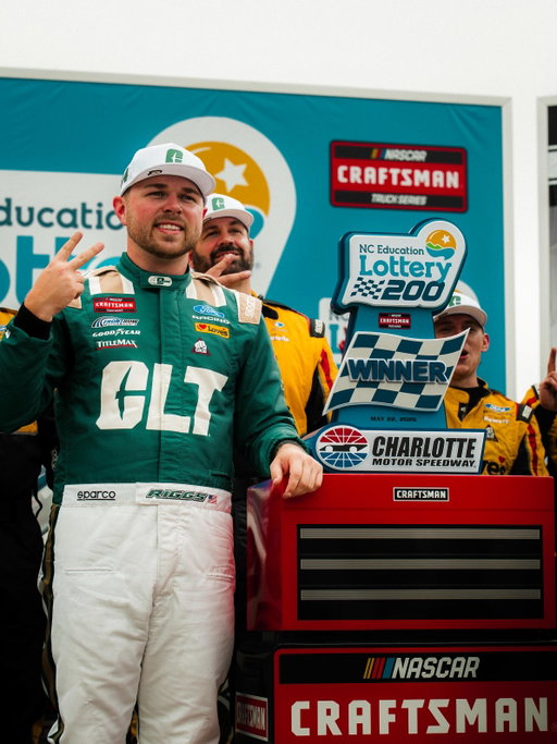 Niner Nation is back in the driver’s seat, with a win!🏆 🏁 #49erAlumni, Layne Riggs hit the track again with a newly designed, @unccharlotte truck for the @crafstmantruckseries race.