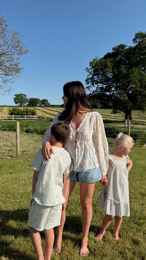 Enjoying the sunshine with my babies, all wearing Newbie 🤍 Simple, timeless styles we reach for every day. This collection is so gorgeous for the kids. Ad @newbielovers #yesnewbie