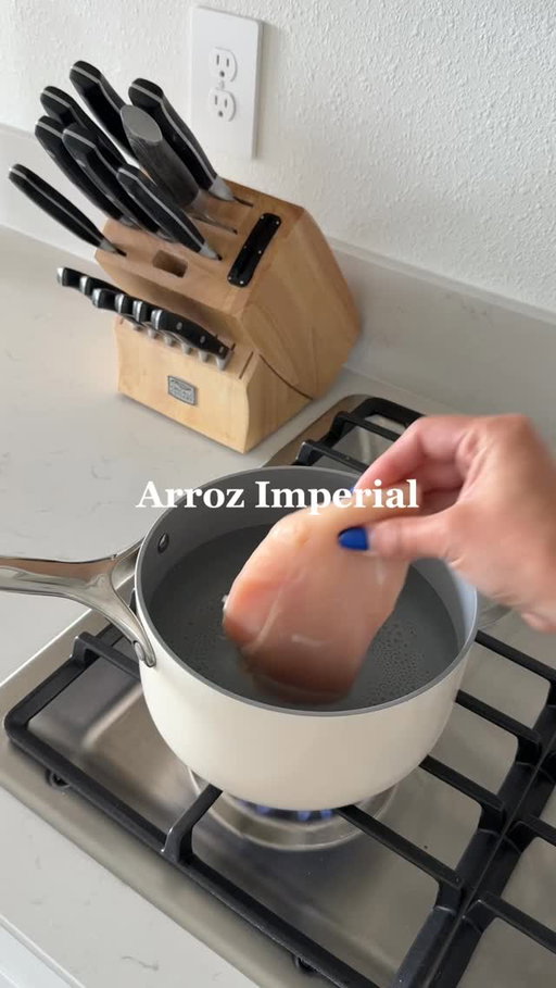 Arroz Imperial ⬇️🇨🇺
2 cups white rice
3 cups water
1 packet Goya Sazón
3 chicken breasts
1 onion
1 red pepper
1 green pepper
Garlic cloves
Oregano 
Cumin 
Adobo seasoning
Bay leaf
Salt & pepper to taste
¼ cup white wine
1 can tomato sauce 
Mayonnaise
Mozzarella cheese, shredded

Boil the chicken breasts in salted water for 20–25 minutes until fully cooked. Shred and set aside.

Cook the rice with 3 cups of water, Sazón, and salt.

In a large pan with olive oil, sauté onion, red pepper, green pepper, and garlic until soft. Add oregano, cumin, adobo, bay leaf, salt, and pepper. Pour in white wine and simmer for 2–3 minutes. Add tomato sauce and shredded chicken, then simmer. 

Preheat oven to 350°F. In a baking dish, layer rice, a thin layer of mayo, and the chicken. Repeat layers and top with mozzarella cheese.

Bake uncovered for 20–25 minutes. Broil for 2–3 minutes for a golden top.

#cubanfood #arrozimperial #latinacontentcreator #latinfood #comidacubana