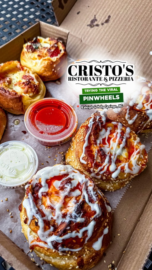 🗣️NC Viral Pizza Pinwheels - 10/10! 🤟🏽
Not gonna lie, quite a few of you had sent us this place, but we didn’t flinch until we saw @callherkrys review of these! Imagine a cinnamon roll sized pizza party in your mouth! It’s filled with cheese, sauce, toppings, and more. These are must try. Honestly, a perfect 10 out of 10!  ENOUGH said, your turn to get 🅃🅁🄰🄿🄿🄴🄳! 

PROTIPS:
😍 Been in business 14 years
🤟🏽 Might be the only place in the area doing these!
🥦 Vegetarian Pinwheel options available!
🏦 Two locations
🚨 Call your order in!

•••••••••••••••
📍 @cristosraleigh - RALEIGH 
       1302 E Millbrook Rd, Raleigh, NC
      919-872-6797

📍 @cristosbistro - HOLLY SPRINGS 
       5217 Sunset Lake Rd, Holly Springs, NC
      919-363-8852
•••••••••••••••

#raleigh #visitnc #northcarolina #explorepage #raleighfood