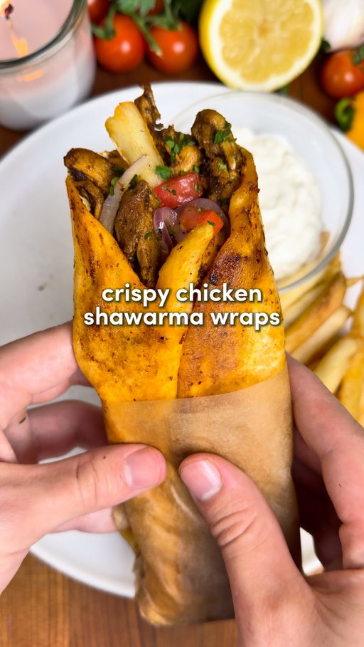 Crispy Chicken Shawarma Wraps 🔥

Comment “Recipe” and I’ll send you the full recipe card for free!!

For all of you asking about my recipe organizing app, search “Osta” on the app or google play store 🫶

Juicy chicken shawarma, creamy garlic sauce and crispy fries wrapped into one perfect bite 🌯

For the Chicken: -1.5 lbs (680g) skinless chicken thighs, sliced into strips -Seasoning: 1 tbsp paprika, 1 tbsp cumin, 1 tbsp onion powder, 2 tsp coriander, 1 tsp allspice, 2 tsp turmeric, 2 tsp black pepper, 1 tsp salt -3 tbsp olive oil -8 garlic cloves, minced -2 tbsp tomato paste -1/3 cup Greek yogurt -½ lemon, juiced

For the Onions: -1 red onion, thinly sliced -2 tbsp olive oil -½ lemon, juiced -1/4 cup fresh parsley, finely chopped -1 tsp salt, 1 tsp black pepper, 2 tsp sumac

For the Garlic Sauce: -1/2 cup Greek yogurt -1/2 cup mayonnaise -3 garlic cloves, minced -1/4 lemon, juiced

For the Red Sauce Glaze: -1/4 cup olive oil + 2 tbsp tomato paste -1 tbsp pomegranate molasses (optional) -1 tsp paprika

For Assembly: -3 Roma tomatoes, diced -Pitas -Frozen french fries

Instructions:

1. In a bowl, combine the sliced chicken, spices, olive oil, garlic, tomato paste, yogurt, and lemon juice. Mix well & marinate for as long as your patience can handle, up to overnight.
2. In a large pan over medium-high heat, add a layer of olive oil. Once hot, add the chicken. Cook undisturbed for 3 mins, then cook for 6–7 more mins, stirring often, until golden & cooked through.
3. In a bowl, combine the sliced red onion, olive oil, lemon juice, parsley, salt, pepper, and sumac. Toss well, set aside.
4. In a bowl, mix the Greek yogurt, mayo, garlic, and lemon juice. Set aside in fridge.
5. In a bowl, whisk olive oil, tomato paste, pomegranate molasses (if using), & paprika.
6. Prepare your French fries however you like. Assemble the wraps: spread a generous layer of garlic sauce onto each pita. Top with chicken, French fries, diced tomatoes & the onions. Wrap tightly.
7. Melt butter in a pan over low heat. Place the wraps seam-side down & brush the tops with the red sauce. Cook until crispy golden, flip, brush the other side, & repeat. Top with more garlic sauce & enjoy!!