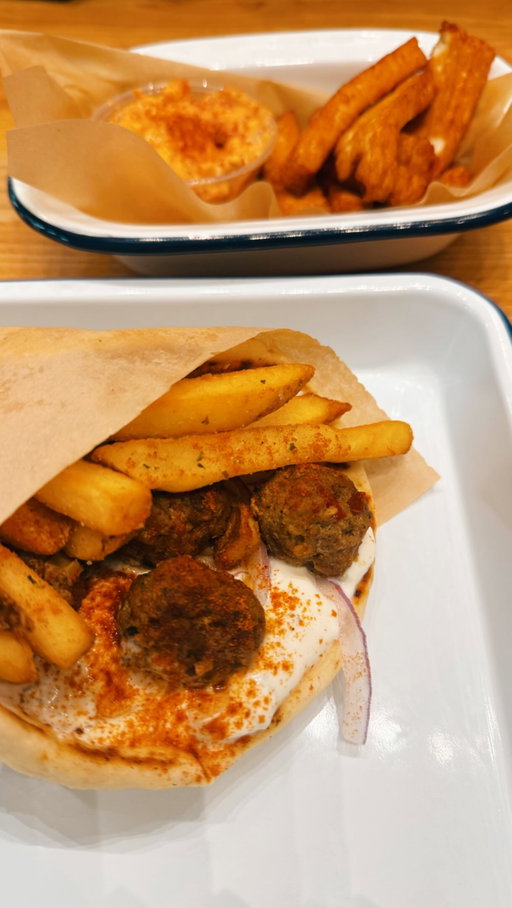 ✨Hosted✨ @kiposgreek Kipos is serving up some great Greek flavors and vibes in Seattle 🇬🇷 

We tried the bifteki pita and meatball pita sandwiches & the halloumi fries (highly recommend 🧀 🤤with lemon yogurt sauce.

Finished with the sour cherry frozen yogurt, which was the perfect sweet-tart ending to the meal.