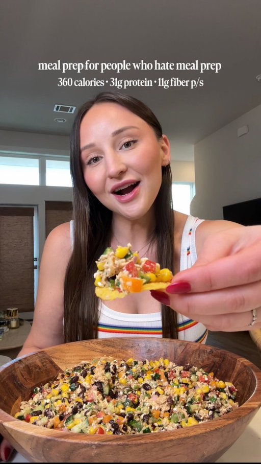 technically healthy meal prep but emotionally chips & dip

my wooden bowl, chicken shredder, and veggie chopper are linked in my bio if you click on ShopMy and then the kitchen tab since you guys always ask☺️

makes 7 servings, approximate macros:
360 calories, 31g protein, 10g fiber per serving
(i have a video showing how to find the serving size on my profile if you need help - it was posted on 1.26)

a little high protein cowboy caviar, perfect for summer 

dressing ingredients:
3 tbsp olive oil🫒 (I used @oliva.dorado - code: Maggie15 - also on my Linktree)
3 tbsp red wine vinegar
1 tbsp hot honey
juice of 1-2 limes
seasonings:
¾ tsp cumin
½ tsp garlic powder
¼ tsp paprika
¼ tsp oregano
¼ tsp chili powder
½ tsp salt 
¼ tsp black pepper

salad ingredients: 
2 red bell peppers
3 Persian cucumbers or 1/2 english cucumber
2 jalapeños 
1 shallot
1 lb boneless, skinless chicken breast, shredded or diced (i seasoned with garlic salt, pepper and paprika)
6 oz. fat free feta (1 container from Trader Joe’s)
2 cans black beans, drained and rinsed 
1 pound bag frozen roasted corn (thaw in microwave and let cool or leave out while preparing salad to thaw)
1/2 - 1 cup fresh chopped cilantro 

**can add more salt to the salad, to taste, once mixed

high protein recipes | lazy girl meals | healthy meal prep | weight loss recipes | macro friendly cooking | healthy recipe | quick high protein meals | easy dinner ideas | low calorie high protein | meal prep ideas | healthy eating | fitness recipes | recipes | bean salad | high protein dinner | high fiber foods | healthy recipes | affordable meal prep

#highprotein #highfiber #mealprep #mealpreprecipes #beans