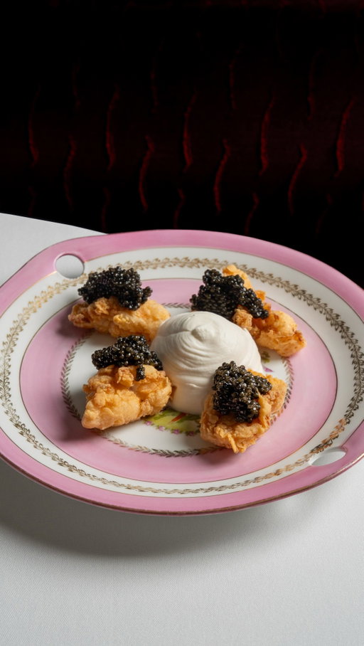 Step into a culinary dream with Chef Alexia du Chêne of @lechenenyc ! Her exquisite opening course features tender cod cheeks paired with delicate caviar and a velvety onion soubise. This dish isn’t just a meal; it’s a masterpiece that redefines elegance on a plate.⁠
.⁠
.⁠
.⁠
.⁠
#petrossian #petrossiancaviar #luxurydining #finedining #gourmetexperience culinarydelights indulgence tasteofluxury exquisiteeats savorthemoment⁠