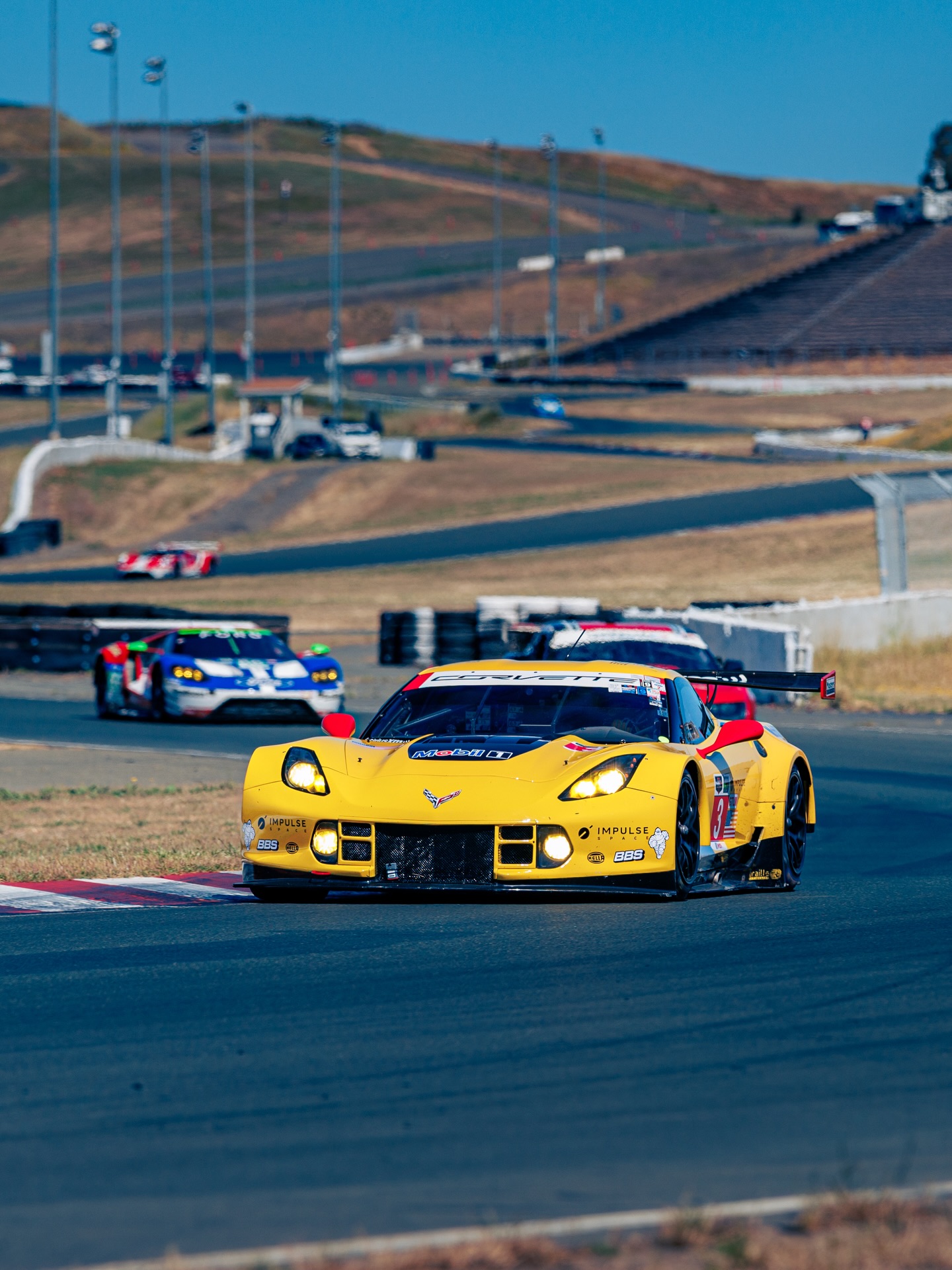 A definite crowd favorite this weekend was the C7.R. The C7.R was developed by Chevrolet and Pratt & Miller in 2013, and is the last front-engined Corvette racer — built on an aluminum monocoque with carbon bodywork, its development intertwined with the road-going Z06. Competing in IMSA’s GTLM class and FIA GTE Pro, the C7.R won 17 races over six seasons, claiming Manufacturer Championships in 2016–17 and Team and Driver titles through 2018.

This car won its class at the 2014 Long Beach Grand Prix, finished second in GTE Pro at the 2014 Le Mans, then swept both the 2015 Rolex 24 at Daytona and the 2015 12 Hours of Sebring.

Photos @MikeyNoga
