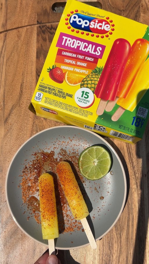 Treat meets heat 🔥 A touch of lime and chili seasoning turns pops intoa sweet and spicy summer snack 🌶️ 

#Popsicle #SweetandSpicy #SnackIdea