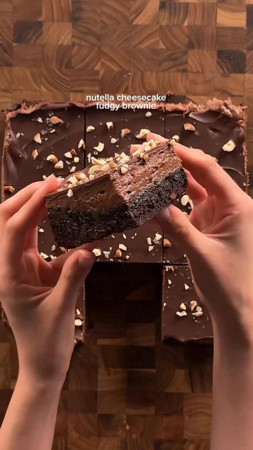nutella cheesecake fudgy brownies
brownie:
3/4 cup (170g) unsalted butter
1 1/2 cups (300g) sugar
3 eggs
3/4 cup (63g) cocoa powder
3/4 tsp (4g) salt 
3/4 tsp (3g) baking powder
2 tsp (8g) vanilla
1 cup + 2 tbsp (140g) ap flour
1/2 cup chocolate chips
*mix together eggs, cocoa powder, salt, baking powder, and vanilla. in a separate bowl add and mix the butter and sugar, then microwave gradually until sugar dissolves and is shiny. combine the egg and butter mixtures well, then add flour and mix gently, do not over mix because it turns cakey. pour into 9x9 pan and bake at 350 for 26-30 min. let cool completely.

nutella cheesecake:
8 oz (226g) cream cheese, soft
1/4 cup (60g) mascarpone
3/4 cup (200g) nutella
1/2 cup (60g) powdered sugar
1-2 tsp lemon juice
1 tsp (4g) vanilla
pinch of salt
*cream the cream cheese and mascarpone together until its smooth. then add in the nutella (melt a bit so its easier to mix), powdered sugar, vanilla, and salt. spread over the cooled brownie and set in the fridge at least an hour. 

topping:
200g semisweet chocolate
chopped hazelnuts
*melt chocolate and pour over the cooled and set cheesecake layer. add on chopped hazelnuts and set in the fridge until top is solid.
