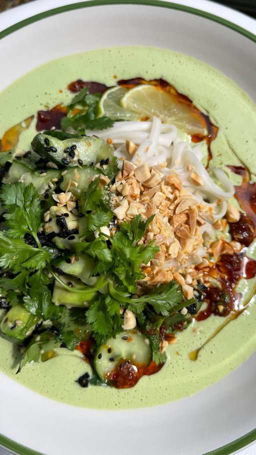 SUPER EASY creamy cucumber, miso and sesame chilled noodles 🥒✨

These noodles are everything you could want from a dish…they take about 10 minutes to throw together, they’re creamy, slightly nutty from the sesame and refreshing from the cucumber. Then wallop, you get hit with tang from lime and umami from miso. It really is a winner, and requires basically no cooking (aside from a quick noodle boil). 

This will rescue you on many balmy evenings this summer…and even in this weird limbo where it’s neither hot nor cold 🤝

RECIPE for 2:

Sauce/soup:
115g cucumber, seeds removed
2.5 tsp sesame oil
1.5 tbsp white miso paste 
2 spring onions, green tops only
1 small garlic clove
1 block silken tofu
10g ginger, peeled
1 lime, juice
¼ tsp sugar
15g fresh coriander
½ lime zest
(optional) green chilli, to taste
Salt to taste

Cucumber salad:
Rest of the cucumber + salt
½ avocado, diced 
½ sheet toasted nori, rolled and sliced into thin strips
1/2 tbsp toasted white sesame seeds
1/2 tbsp toasted black sesame seeds
A handful fresh coriander leaves, roughly torn or chopped
Squeeze of lime

To serve:
2 servings noodles of choice
35g peanuts, finely chopped
Chilli oil and/or sesame oil
Wedge of lime

1. Blend all of the ingredients for the sauce until completely smooth

2. Bash the rest of the cucumber with a rolling pin or something heavy. Cut the smashed cucumber up into bitesize pieces then place into a bowl with a pinch of salt. Leave to sit for around 5 minutes, whilst you cook the noodles. 

3. Drain the cucumber then add the rest of the salad ingredients to the bowl and season to taste. 

4. Rinse the cooked noodles under cold water to stop cooking then add to 2 bowls. Pour the soup/sauce around the noodles then top with the cucumber salad, peanuts and chilli/sesame oil. Squeeze over a wedge of lime and enjoy!

#chillednoodles #noodles