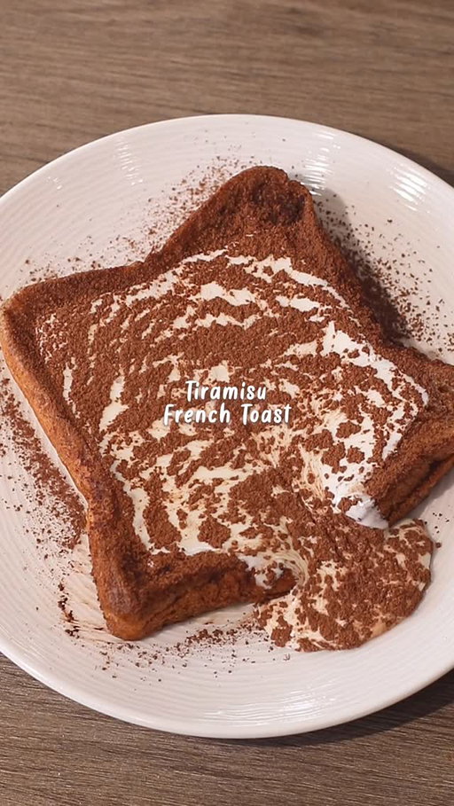 ☕️🍞 Tiramisu Lava Toast
Coffee Toast with Mascarpone Cream

📝 Recipe

1 Egg
30g • Milk
1 Shot / 30ml • Espresso
2 Slices • Bread
10g • Sweetened Condensed Milk
1 tbsp • Butter
1 tbsp • Cocoa Powder

Mascarpone Cream 🥛:
20g • Milk
20g • Whipping Cream 
20g • Mascarpone
10g • Icing Sugar

Instructions:

• Egg Mixture
- crack open 1 egg, pour milk and espresso
- whisk the mixture until everything combined

• Soaking; Bread
- prepare 1 slice of bread and spread condensed milk
- stack another bread on top
- soak / dip the bread into egg mixture

• Cooking; Bread
- melt butter on a pan in medium heat
- cook the bread and flip the bread until both sides are cooked

• Mascarpone Cream
- pour whipping cream and milk
- put mascarpone and icing sugar
- mix everything until creamy with a hand mixer

• Finishing; Tiramisu French Toast
- flatten french toast in the middle to make space for the mascarpone cream
- pour the mascarpone cream on top
- sprinkle a layer of cocoa powder on top with a strainer

//

Easy recipe at home with IC! 👩‍🍳

—

#frenchtoast #breadrecipe #tiramisu #lavatoast #coffeetime