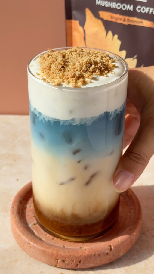 Summer might not officially start until 6/20, but in our minds we’re already there… 🌞🌊 

Just as summer-obsessed as us? You’ll want to try this ice latte recipe asap👇

🌊 Salted caramel ocean latte 🌊

You’ll need:
-2 tsp butterfly pea flower tea
-3 oz hot water, divided
-2 tbsp caramel sauce
-1 tbsp RYZE Mushroom Coffee
-8 oz milk of choice
-2 oz heavy whipping cream
-A generous pinch of sea salt
-1 tbsp crushed graham crackers

Directions:

1️⃣ Combine your butterfly pea flower tea with 1 oz of your hot water, then stir and let steep for 5 minutes. Set aside to chill. 

2️⃣ Add your caramel sauce, RYZE Mushroom Coffee, and the remaining 2 oz of hot water to a small cup and stir to combine. Set aside to chill. 

3️⃣ In a small bowl or cup, add your heavy whipping cream and sea salt and froth for 45 seconds to one minute or until light and frothy.

4️⃣ Add ice to your glass followed by the caramel, RYZE coffee, and milk. Pour your butterfly pea flower tea slowly over an ice cube to get the layer effect. Top with your sea salt cream and garnish with crushed graham crackers. Stir and enjoy! 🌟

👩‍🍳 Recipe creds: @ac_homecafe