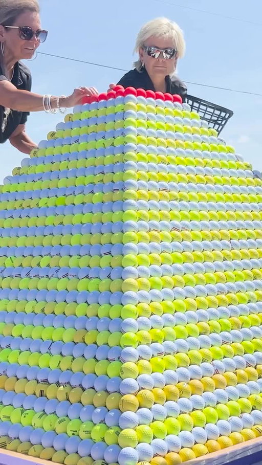 Largest golf ball pyramid ⛳ 19,019 balls by Michael Furrh, Debbie Reynolds, and Terri Janak 🇺🇸

This attempt took place at the Benbrook Par 3 and driving range in Texas, USA with the pyramid consisting of 38 rows of golf balls.